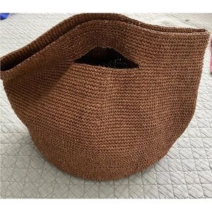Lauren Manoogian crocheted brown bucket bag